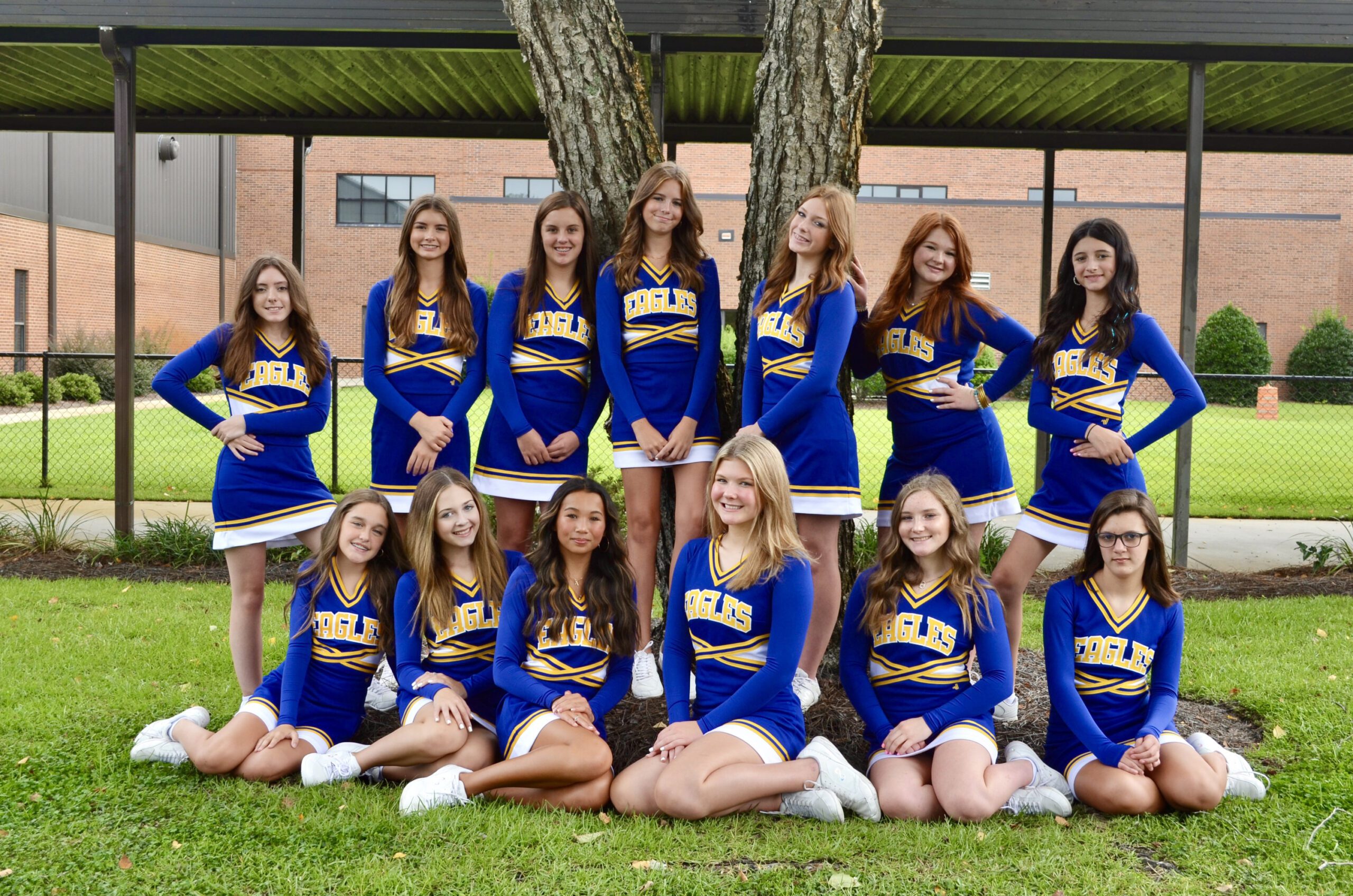 Girls posing in their cheer uniform at Florence Christian School